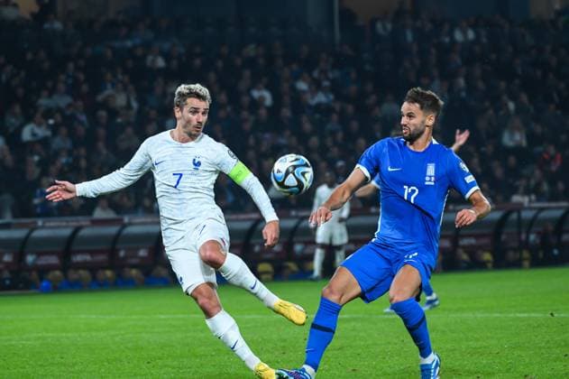 Greece v France: Group B - UEFA EURO, EM, Europameisterschaft,Fussball 2024 European Qualifiers Antoine Griezmann of France is competing with Pantelis Hatzidiakos of Greece during the European Qualifiers for Euro 24, Group B match between Greece and France at OPAP Arena in Athens, Greece, on November 21, 2023. Athens Greece  Copyright: xStefanosxKyriazisx originalFilename:kyriazis-greecevs231121_npB56.jpg