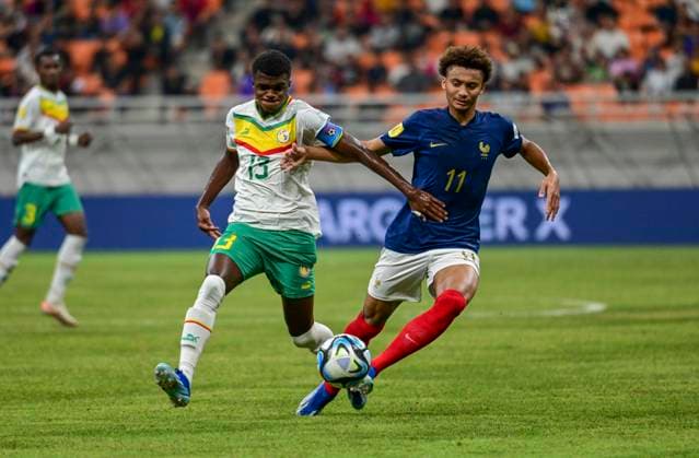 (231122) -- JAKARTA, Nov. 22, 2023 -- Tidiam Gomis (R) of France competes with Alpha Toure of Senegal during the round of 16 match of the FIFA U-17 World Cup Indonesia 2023 between France and Senegal at The Jakarta International Stadium in Jakarta, Indonesia, Nov. 22, 2023. ) (SP)INDONESIA-JAKARTA-FOOTBALL-FIFA U17, U 17 WORLD CUP-ROUND OF 16-FRA VS SEN Zulkarnain 
