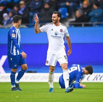 Ivan Marquez 1 FC Nuernberg, 15 is unhappy with a referee decision, GER, Karlsruher SC vs 1 FC Nuernberg, Sport, Soccer, Men, 2 Bundesliga, Matchday 14, Season 2023 2024, 26 11 2023, DFL REGULATES PROHIBIT ANY USE OF PHOTOGRAPHS AS IMAGE SEQUENCES AND OR QUASI VIDEO GER, Karlsruher SC vs 1 FC Nuernberg, Sport, Football, Men, 2 Bundesliga, Matchday 14, Season 2023 2024, 26 11 2023, Karlsruhe Copyright: xEibner-Pressefoto SilasxSchuellex EP_SSR