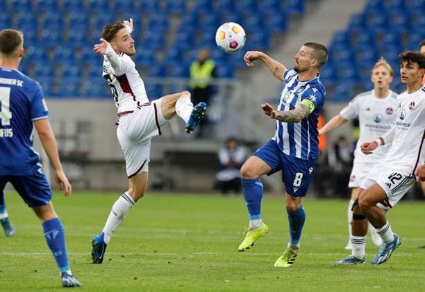 26 11 2023 Soccer Season 2023 2024 2 Soccer Bundesliga 14 Matchday Karlsruher SC KSC 1 FC Nürnberg FCN Club Sportfoto Zink DaMa xdaxmax DFL regulations prohibit any use of photographs as image sequences and or quasi video only for editorial use Lukas Schleimer 36, 1 FC Nürnberg FCN Jerome Gondorf 8, Karlsruher SC KSC