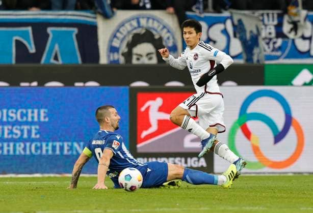 26 11 2023 Soccer Season 2023 2024 2 Soccer Bundesliga 14 Matchday Karlsruher SC KSC 1 FC Nuremberg FCN Club Sportfoto Zink DaMa xdaxmax DFL regulations prohibit any use of photographs as image sequences and or quasi video only for editorial use Jerome Gondorf 8, Karlsruher SC KSC Kanji Okunuki 11, 1 FC Nuremberg FCN