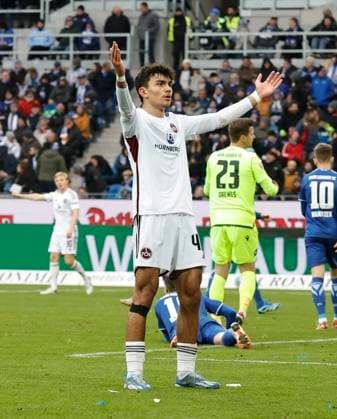 26 11 2023 Soccer season 2023 2024 2 Soccer Bundesliga 14 Matchday Karlsruher SC KSC 1 FC Nuremberg FCN Club Sportfoto Zink DaMa xdaxmax DFL regulations prohibit any use of photographs as image sequences and or quasi video only for editorial use Jubel Freude Torjubel nach Tor zum 1 1 Can Yilmaz Uzun 42, 1 FC Nuremberg FCN jubelt freut sich Torschütze Can Yilmaz Uzun 42, 1 FC Nuremberg FCN