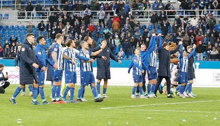 26 11 2023 Soccer Season 2023 2024 2 Soccer Bundesliga 14 Matchday Karlsruher SC KSC 1 FC Nürnberg FCN Club Sportfoto Zink DaMa xdaxmax DFL regulations prohibit any use of photographs as image sequences and or quasi video only for editorial use joy jubilation after end of match team team of KSC celebrates with spectators audience fans jubilation chain jubilation wave