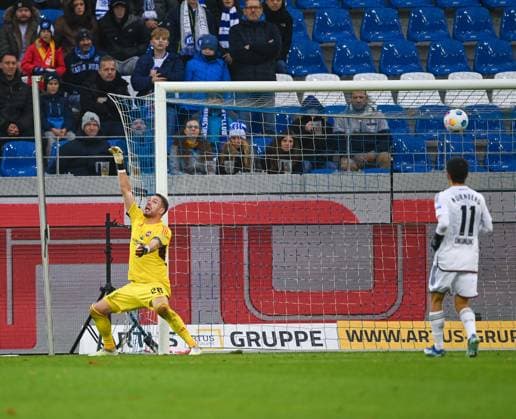 Christian Mathenia 1 FC Nuernberg, 26 cannot hold the ball from Budu Zivzivadze Karlsruher SC, 11, not in the picture, the goal to 4 1 for Karlsruhe, GER, Karlsruher SC vs 1 FC Nuernberg, Sport, Football, Men, 2 Bundesliga, Matchday 14, Matchday 2023 2024, 26 11 2023, DFL REGULATES PROHIBIT ANY USE OF PHOTOGRAPHS AS IMAGE SEQUENCES AND OR QUASI VIDEO GER, Karlsruher SC vs 1 FC Nuernberg, Sport, Football, Men, 2 Bundesliga, 14 Matchday, Matchday 2023 2024, 26 11 2023, Karlsruhe Copyright: xEibner-Pressefoto SilasxSchuellex EP_SSR