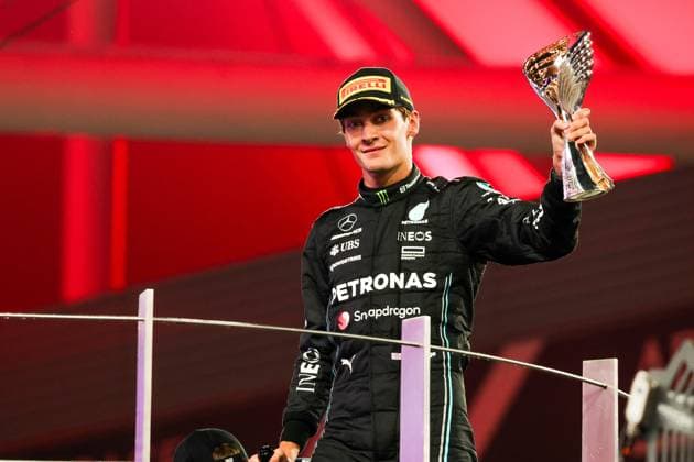RUSSELL George (gbr), Mercedes AMG F1 Team W14, portrait celebrates his third place on podium during the 2023 Formula 1 Etihad Airways Abu Dhabi Grand Prix, 22th round of the 2023 Formula One World Championship, WM, Weltmeisterschaft from November 24 to 26, 2023 on the Yas Marina Circuit, in Abu Dhabi - F1 - ABU DHABI GRAND PRIX 2023 - RACE DPPI Panoramic  F12023GP23ABU_HZ_9382