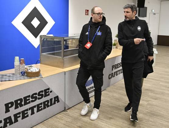 Antwerp s head coach Mark van Bommel (R) pictured after a press conference, PK, Pressekonferenz of Belgian soccer team Royal Antwerp FC, on Monday 27 November 2023 in Hamburg, Germany. The team is preparing for tomorrow s game against Ukrainian club Shakhtar Donetsk, on day five of the Champions League group stage, in group H. TOM GOYVAERTS TomxGoyvaerts  x80935236x