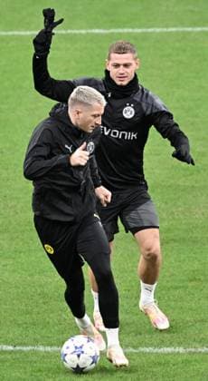 November 27, 2023, Milan, Italy: Borussia Dortmund™s midfielder Marco Rues (L) and teammate defender Julian Ryerson attend a training session at the Giuseppe Meazza stadium in MIlan, Italy, 27 Novembre 2023. Dortmund will play against AC MIlan on 28 Nvvembre in their UEFA Champions League group F soccer match. ANSA DANIEL DAL ZENNARO Borussia Dortmund training session  - ZUMAa110 20231127_zaf_a110_016 Copyright: xDanielxDalxZennarox