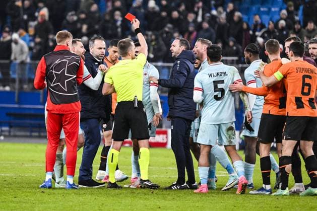 Antwerp s Arbnor Muja receives a red card from the referee after a soccer match between Ukrainian Shakthar Donetsk and Belgian Royal Antwerp FC, on Tuesday 28 November 2023 in Hamburg, Germany, on day five of the Champions League group stage, in group H. TOM GOYVAERTS TomxGoyvaerts  x81031227x