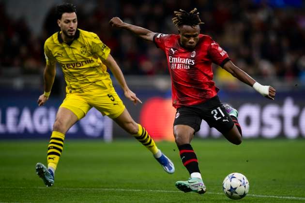 AC Milan v Borussia Dortmund - UEFA Champions League Samuel Chukwueze of AC Milan competes for the ball with Ramy Bensebaini of Borussia Dortmund during the Serie A football match between AC Milan and Borussia Dortmund. Milan Italy Copyright: xNicolòxCampox