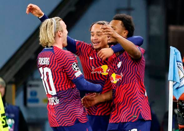 Football - 2023 2024 UEFA Champions League - Group G - Matchday Five of Six - Manchester City vs RB Leipzig - Etihad Stadium - Tuesday 28th November 2023 Lois Openda of RB Leipzig celebrates with Emil Forsberg and Xavi Simons after putting his side 1-0 ahead, at the Etihad. 