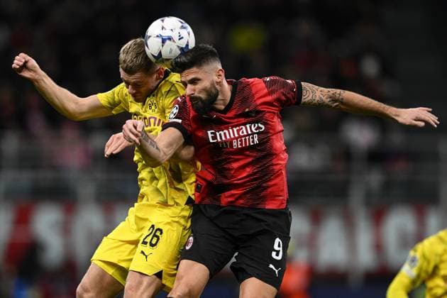Mg Milano 28 11 2023 - Champions League Milan-Borussia Dortmund foto Matteo Gribaudi Image nella foto: Olivier Giroud-Julian Ryerson 