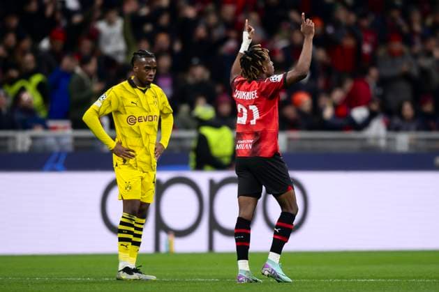 AC Milan v Borussia Dortmund - UEFA Champions League Samuel Chukwueze of AC Milan celebrates after scoring a goal as Jamie Bynoe-Gittens of Borussia Dortmund looks dejected during the Serie A football match between AC Milan and Borussia Dortmund. Milan Italy Copyright: xNicolòxCampox