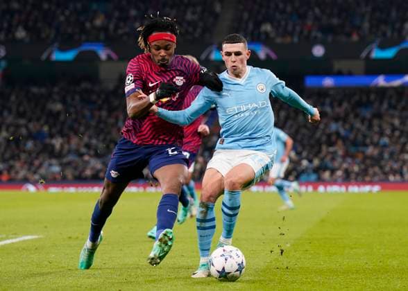 Manchester City v Leipzig - UEFA Champions League - Group G - Etihad Stadium November 28, 2023, MANCHESTER: Manchester, England, 28th November 2023. Mohamed Simakan of RB Leipzig tackles Phil Foden of Manchester City during the UEFA Champions League match at the Etihad Stadium, Manchester. (Credit Image: Ã‚Â Andrew Yates Sportimage Cal Media) MANCHESTER EDITORIAL USE ONLY Copyright: xx ZUMA-20231128_faf_si1_118.jpg AndrewxYatesx csmphotothree204790