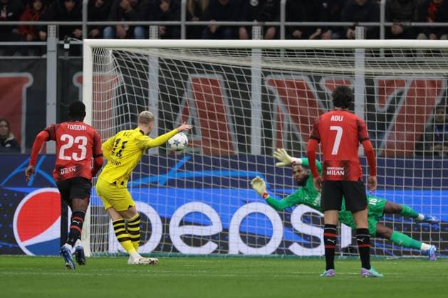Milan, Italy, 28th November 2023. Marco Reus of Borussia Dortmund scores a penalty to give the visitors a 1-0 lead during the UEFA Champions League match at Giuseppe Meazza, Milan. Picture credit should read: Jonathan Moscrop Sportimage EDITORIAL USE ONLY. No use with unauthorised audio, video, data, fixture lists, club league logos or live services. Online in-match use limited to 120 images, no video emulation. No use in betting, games or single club league player publications. SPI-2754-0001