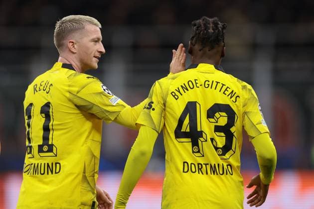 Milan, Italy, 28th November 2023. Marco Reus of Borussia Dortmund congratulates team mate Jamie Bynoe-Gittens after he scored to give the side a 2-1 lead during the UEFA Champions League match at Giuseppe Meazza, Milan. Picture credit should read: Jonathan Moscrop Sportimage EDITORIAL USE ONLY. No use with unauthorised audio, video, data, fixture lists, club league logos or live services. Online in-match use limited to 120 images, no video emulation. No use in betting, games or single club league player publications. SPI-2754-0021