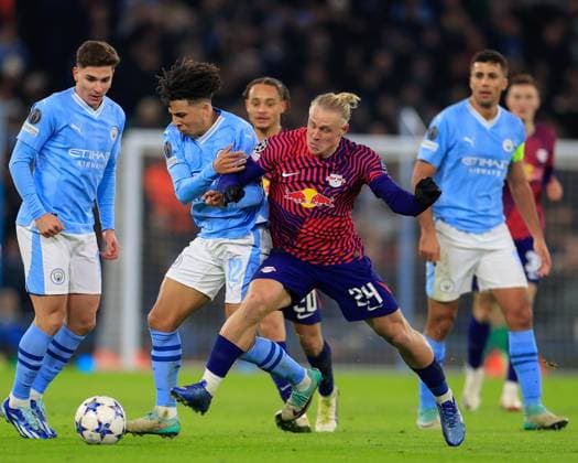 UEFA Champions League Group G Manchester City v RB Leipzig Rico Lewis 82 of Manchester City and Xaver Schlager 24 of RB Leipzig battle for the ball during the UEFA Champions League Group G match Manchester City vs RB Leipzig at Etihad Stadium, Manchester, United Kingdom, 28th November 2023 (Photo by Conor Molloy News Images) Manchester Etihad Stadium Manchester United, ManU Kingdom Copyright: xConorxMolloy NewsxImagesx