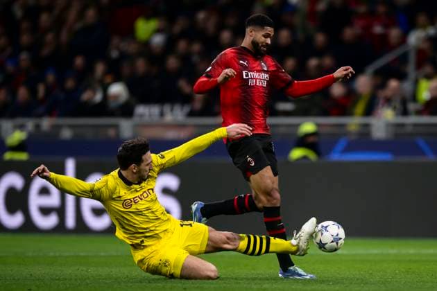 AC Milan v Borussia Dortmund - UEFA Champions League Ruben Loftus-Cheek of AC Milan i tackled by Mats Hummels of Borussia Dortmund during the Serie A football match between AC Milan and Borussia Dortmund. Milan Italy Copyright: xNicolòxCampox