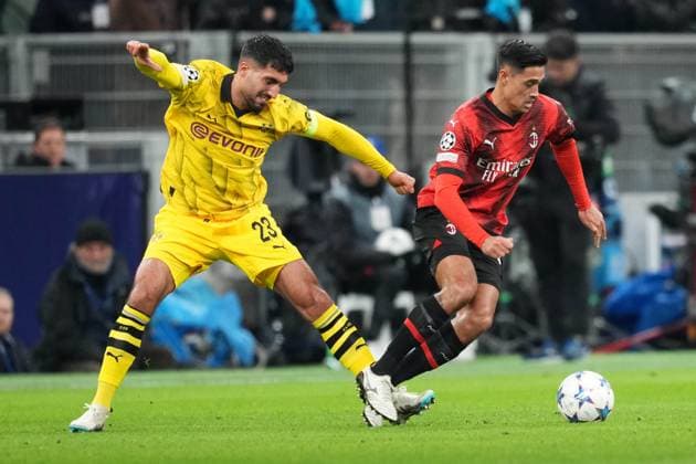 MILAN, ITALY NOVEMBER 28 Tijjani Reijnders of Milan R against Emre Can of Dortmund L during the UEFA Champions League Group Stage match between AC Milan and Borussia Dortmund at Stadio Giuseppe Meazza on November 28, 2023 in Milan, Italy Milan Stadio Giuseppe Meazza Italy Copyright: xJustPictures.ch JarixPestelaccix jp-en-EuSpIm-Milan_Dortmund_28Nov2023_JAR_00029
