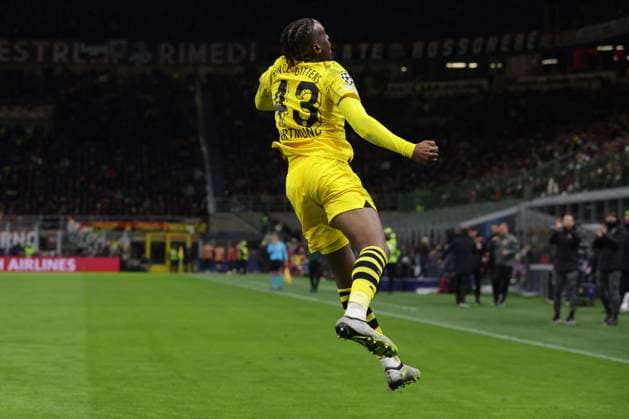 Milan, Italy, 28th November 2023. Jamie Bynoe-Gittens of Borussia Dortmund celebrates with team mates after scoring to give the side a 2-1 lead during the UEFA Champions League match at Giuseppe Meazza, Milan. Picture credit should read: Jonathan Moscrop Sportimage EDITORIAL USE ONLY. No use with unauthorised audio, video, data, fixture lists, club league logos or live services. Online in-match use limited to 120 images, no video emulation. No use in betting, games or single club league player publications. SPI-2754-0032