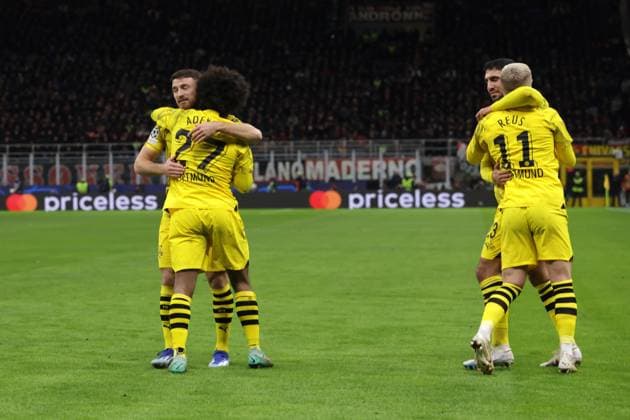 Milan, Italy, 28th November 2023. Karim Adeyemi of Borussia Dortmund celebrates with team mates after scoring to give the side a 3-1 lead during the UEFA Champions League match at Giuseppe Meazza, Milan. Picture credit should read: Jonathan Moscrop Sportimage EDITORIAL USE ONLY. No use with unauthorised audio, video, data, fixture lists, club league logos or live services. Online in-match use limited to 120 images, no video emulation. No use in betting, games or single club league player publications. SPI-2754-0041