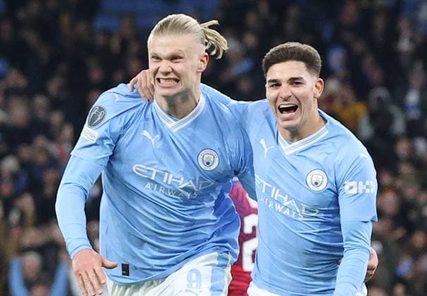 28th November 2023; Etihad Stadium, Manchester, England; Champions League Football, Group Stage, Manchester City versus RB Leipzig; Julian Alvarez of Manchester City celebrates after scoring his team& x2019;s third goal for 3-2 after 87 minutes with team mate Erling Haaland  ActionPlus12580894 DavidxBlunsden