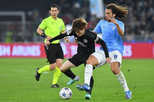 Soccer, Champions League match , Lazio v Celtic Kyogo Furuhashi of Celtic ,Matteo Guendouzi of SS Lazio during the Champions League match between Lazio v Celtic at Olympic stadium, Italy, November 28th, 2023. Imago-Images Emmefoto Copyright: xImago-Images Emmefotox