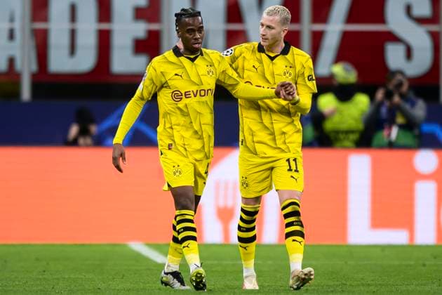 AC Milan v Borussia Dortmund - UEFA Champions League Jamie Bynoe-Gittens of Borussia Dortmund celebrates with Marco Reus of Borussia Dortmund after scoring a goal during the Serie A football match between AC Milan and Borussia Dortmund. Milan Italy Copyright: xNicolòxCampox