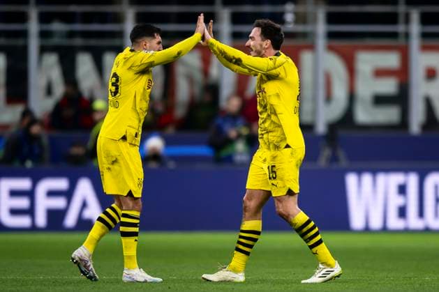 AC Milan v Borussia Dortmund - UEFA Champions League Emre Can of Borussia Dortmund celebrates the victory with Mats Hummels of Borussia Dortmund at the end of the Serie A football match between AC Milan and Borussia Dortmund. Milan Italy Copyright: xNicolòxCampox