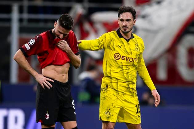 AC Milan v Borussia Dortmund - UEFA Champions League Mats Hummels of Borussia Dortmund consoles Olivier Giroud of AC Milan at the end of the Serie A football match between AC Milan and Borussia Dortmund. Milan Italy Copyright: xNicolòxCampox