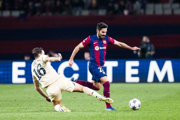 November 28, 2023, Barcelona, Barcelona, Spain: Ilkay Gundogan of FC Barcelona, Barca in action against Nico Gonzalez of FC Porto during the UEFA Champions League Group H, match played between FC Barcelona and FC Porto at Olimpic de Montjuic stadium on November 28, 2023 in Barcelona, Spain. Barcelona Spain - ZUMAa181 20231128_zaa_a181_129 Copyright: xJavierxBorregox