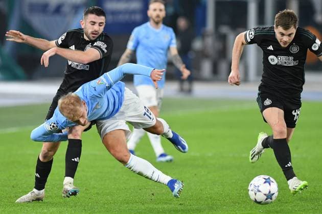 Greg Taylor of Celtic,Gustv Isaksen of SS Lazio during the Champions League match between Lazio v Celtic at Olympic stadium, Italy, November 28th, 2023. Photographer01  Copyright: xFotografo01x xipa-agency.netx xFotografo01x IPA_41921124 IPA_Agency_IPA41921124