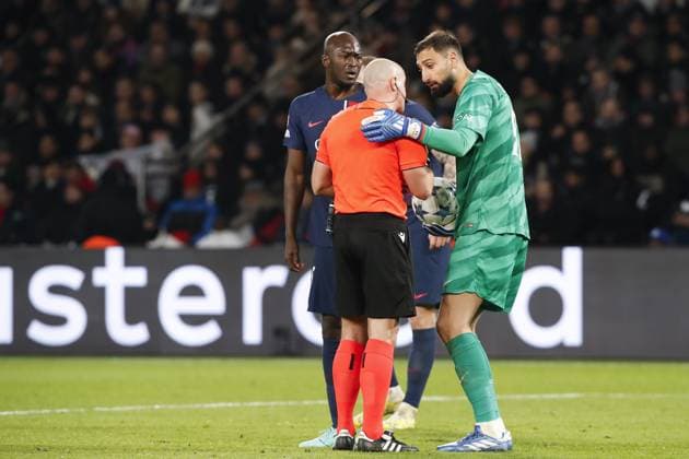 Szymon Marciniak (arbitre) - Gianluigi Donnarumma (PSG) - Danilo Pereira (PSG) FOOTBALL : Paris Saint Germain Vs Newcastle - Ligue des Champions - 28 11 2023 MichaelBaucher Panoramic 