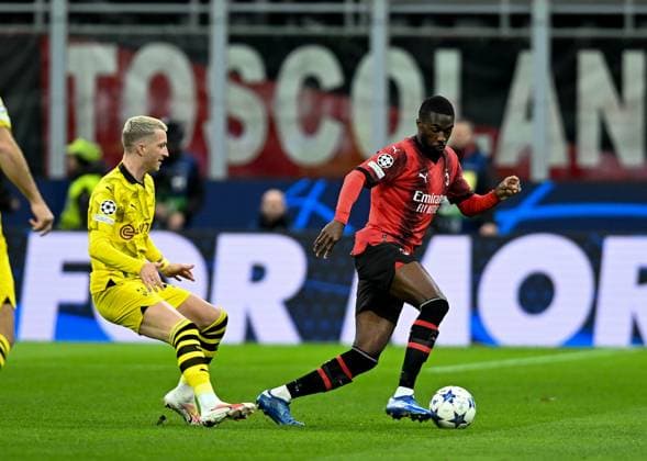 (231129) -- MILAN, Nov. 29, 2023 -- Milan s Fikayo Tomori (R) vies with Borussia Dortmund s Marco Reus during the UEFA Champions League Group F match between AC Milan and Borussia Dortmund in Milan, Italy, Nov. 28, 2023. (Photo by Xinhua) (SP)ITALY-MILAN-FOOTBALL-UEFA CHAMPIONS LEAGUE-AC MILAN VS BORUSSIA DanielexMascolo 