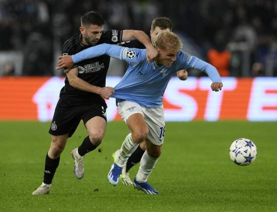 (231129) -- ROME, Nov. 29, 2023 -- Lazio s Gustav Isaksen (R) vies with Celtic s Greg Taylor during the UEFA Champions League Group E match between Lazio and Celtic in Rome, Italy, Nov. 28, 2023. (Photo by Xinhua) (SP)ITALY-ROME-UEFA CHAMPIONS-LAZIO VS CELTIC AugustoxCasasoli 