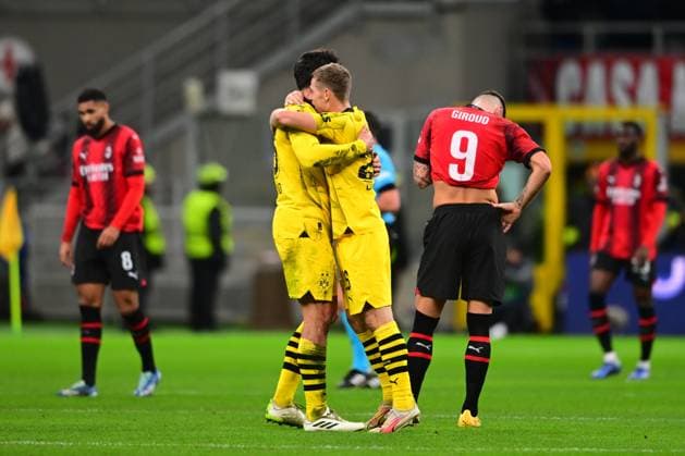 Italy, Milan, 28 11 2023, San Siro Stadium, AC Milan Borussia Dortmund UEFA Champions League 2023 2024 Group F, Emre Can of Borussia Dortmund and Julien Duranville of Borussia Dortmund celebrate after winning Milan San Siro Stadium Lombardy Italy  eu-images-560
