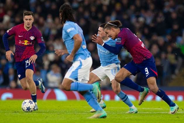 Manchester City v RB Leipzig: Group G - UEFA Champions League 2023 24 Phil Foden 47 of Manchester City is being tackled by Yussuf Poulsen 9 of RB Leipzig during the UEFA Champions League, Group G match between Manchester City and RB Leipzig at the Etihad Stadium in Manchester, on November 28, 2023. Manchester Manchester United, ManU Kingdom  Copyright: xMIxNewsx originalFilename:fletcher-manchest231128_nplJu.jpg
