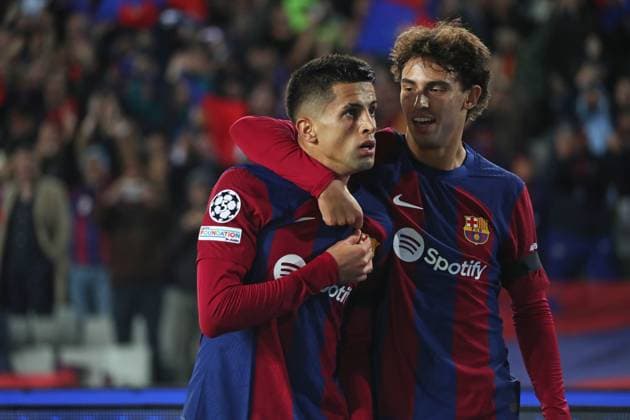 FC Barcelona, Barca v FC Porto: Group H - UEFA Champions League 2023 24 Joao Cancelo and Joao Felix are celebrating a goal during the match between FC Barcelona and FC Porto for week 5 of the group stage of the UEFA Champions League, played at the Olympic Stadium Lluis Companys in Barcelona, Spain, on November 28, 2023. Barcelona Barcelona Spain  Copyright: xUrbanandsportx originalFilename:urbanandsport-fcbarcel231128_np3JZ.jpg