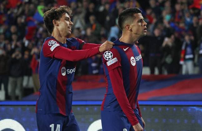 FC Barcelona, Barca v FC Porto: Group H - UEFA Champions League 2023 24 Joao Cancelo and Joao Felix are celebrating a goal during the match between FC Barcelona and FC Porto for week 5 of the group stage of the UEFA Champions League, played at the Olympic Stadium Lluis Companys in Barcelona, Spain, on November 28, 2023. Barcelona Barcelona Spain  Copyright: xUrbanandsportx originalFilename:urbanandsport-fcbarcel231128_npZ2G.jpg