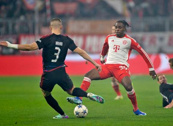 29 11 2023, Football UEFA Championsleague 2023 2024 5 Matchday Preliminary Round, FC Bayern Munich FC Copenhagen, at Allianz Arena Munich v l Denis Vavro FC Copenhagen v Mathys Tel Bayern Munich DFL and DFB regulations prohibit any use of photographs as image sequences and or quasi video