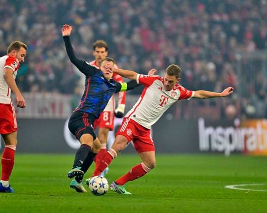 29 11 2023, Football UEFA Championsleague 2023 2024 5 Matchday Preliminary Round, FC Bayern Munich FC Copenhagen, at Allianz Arena Munich v l Viktor Claesson FC Copenhagen v Joshua Kimmich FC Bayern Munich DFL and DFB regulations prohibit any use of photographs as image sequences and or quasi video