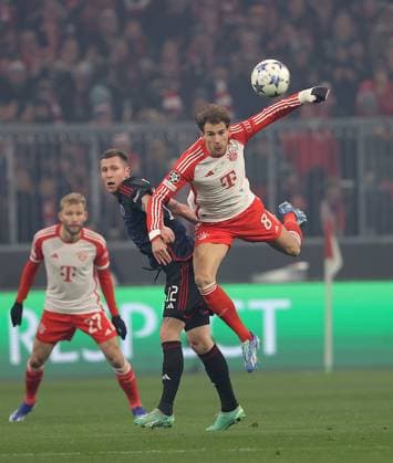 Copenhagens 12 LERAGER in duel with Bayerns 8 Leon GORETZKA Football, Bayern Muenchen Copenhagen Football UEFA Champions League, FC Bayern München FC Copenhagen, Group stage, match day 5, season 2023 2024, on 29 11 2023, in Munich, A L L I A N Z A R E N A, Germany Source Copyright Credit Oryk HAIST xFUSSBALL-MUENCHEN-KOPENHAGENx
