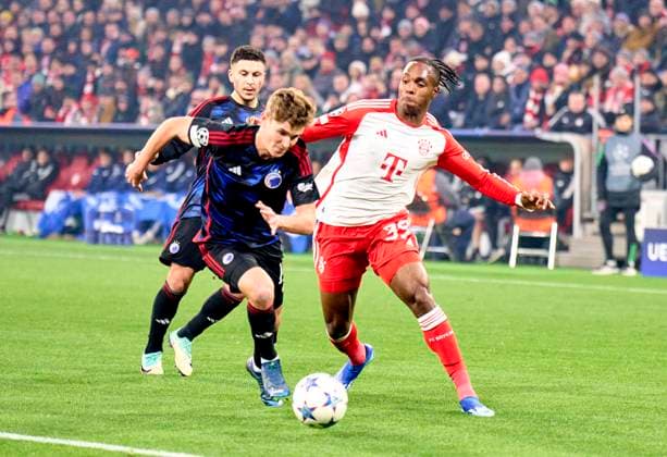 Mathys Tel, FCB 39 compete for the ball, tackling, duel, header, zweikampf, action, fight against Elias Jelert, Kopenhagen Nr. 19 in the group stage match FC BAYERN MUENCHEN - FC COPENHAGEN of football UEFA Champions League in season 2023 2024 in Munich, Nov 29, 2023. Gruppenphase, Kopenhagen, FCB, München