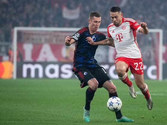Raphael Guerreiro FC Bayern Muenchen, 22 in duel with Lukas Lerager FC Copenhagen, 12 , GER, FC Bayern Muenchen FCB vs FC Copenhagen FCK , Soccer, UEFA Champions League, Matchday 5, Group A, Season 2023 2024, 29 11 2023 DFB DFL regulations prohibit any use of photographs as image sequences and or quasi video GER, FC Bayern Muenchen FCB vs FC Copenhagen FCK , Football, UEFA Champions League, Matchday 5, Group A, Season 2023 2024, 29 11 2023 Muenchen Copyright: xEibner-Pressefoto Memmlerx EP_MMR