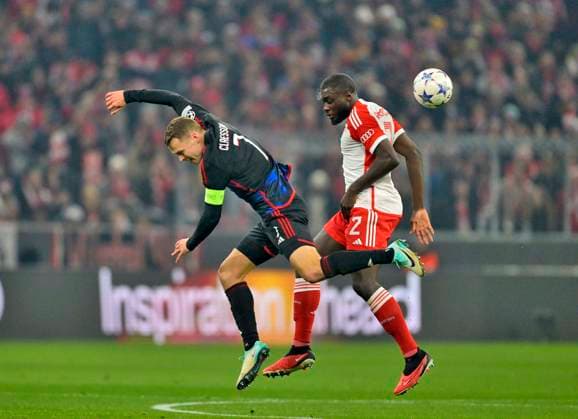 29 11 2023, Football UEFA Championsleague 2023 2024 5 Matchday Preliminary Round, FC Bayern Munich FC Copenhagen, at Allianz Arena Munich v l Viktor Claesson FC Copenhagen v Dayot Upamecano FC Bayern Munich DFL and DFB regulations prohibit any use of photographs as image sequences and or quasi video