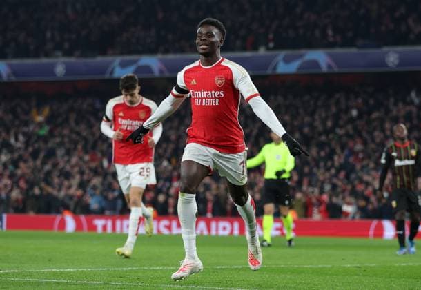 London, England, 29th November 2023. Bukayo Saka of Arsenal celebrates after scoring to make it 3-0 during the UEFA Champions League match at the Emirates Stadium, London. Picture credit should read: Paul Terry Sportimage EDITORIAL USE ONLY. No use with unauthorised audio, video, data, fixture lists, club league logos or live services. Online in-match use limited to 120 images, no video emulation. No use in betting, games or single club league player publications. SPI-2761-0013