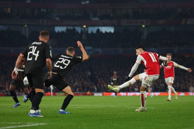 29th November 2023; Emirates Stadium, London, England; Champions League Football, Group Stage, Arsenal versus Lens; Gabriel Martinelli of Arsenal shoots and scores for 4-0 in the 27th minute  ActionPlus12581191 ShaunxBrooks