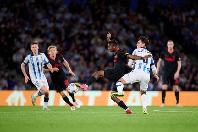 SOCCER - UEFA CL, Sociedad vs RBS SAN SEBASTIAN,SPAIN,29.NOV.23 - SOCCER - UEFA Champions League, group stage, Real Sociedad vs Red Bull Salzburg. Image shows Dorgeles Nene (RBS) and Martin Zubimendi (Sociedad).  GEPAxpictures xDanielxFernandezxPerez