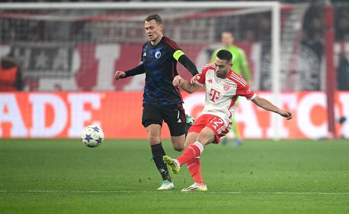FOOTBALL CHAMPIONS LEAGUE SEASON 2023 2024 Preliminary Round Group A 5 Matchday FC Bayern Muenchen FC Copenhagen 29 11 2023 Viktor Claesson left, FC Copenhagen v Raphael Guerreiro right, FC Bayern Muenchen