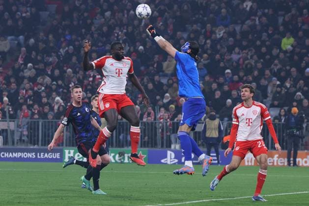Soccer Champions League Group Stage 5 Matchday FC Bayern Munich FC Copenhagen on 29 11 2023 at the Allianz Arena in Munich Dayot Upamecano Munich , left Kamil Grabara Copenhagen , right xMSx