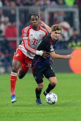 in duel, action, with Mathys Tel 39 FC Bayern Muenchen , Elias Jelert 19 FC Copenhagen , FC Bayern Muenchen vs FC Copenhagen, Champions League, football, preliminary round, second leg, 29 11 2023 Muenchen Bayern Germany Copyright: xkolbert-press ChristianxKolbertx